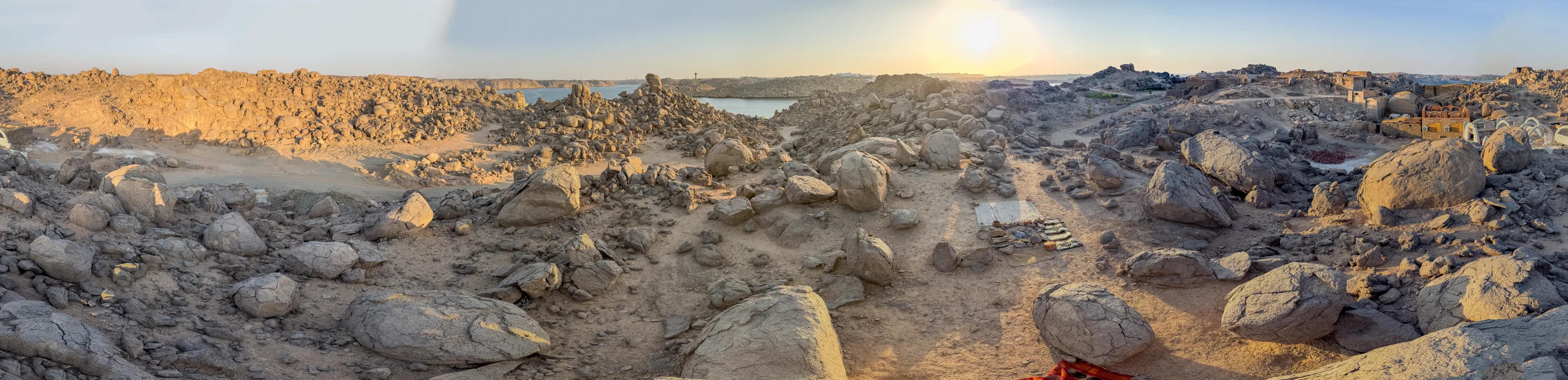 Panoramic view of the rocky site on Bigeh at sunset, the Nile behind